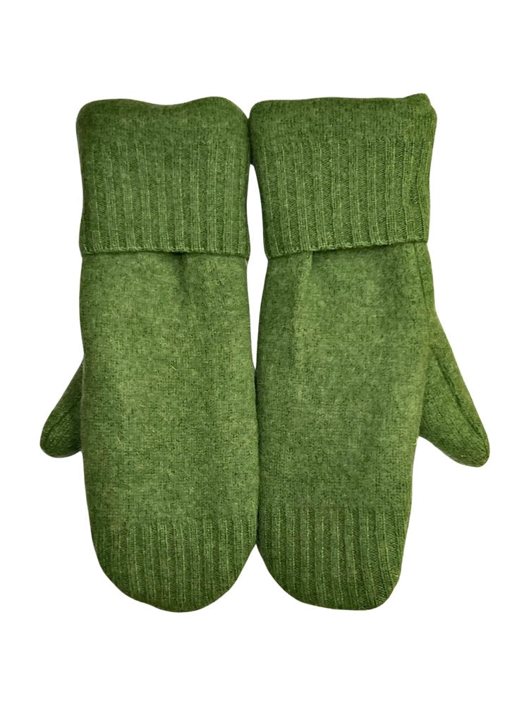 Traditional mittens are made from felted, fleece lined wool & are decorated with vintage or reclaimed buttons. Mittens fit most average women’s hands. Measurements: 11”L, 4”, 1” thick