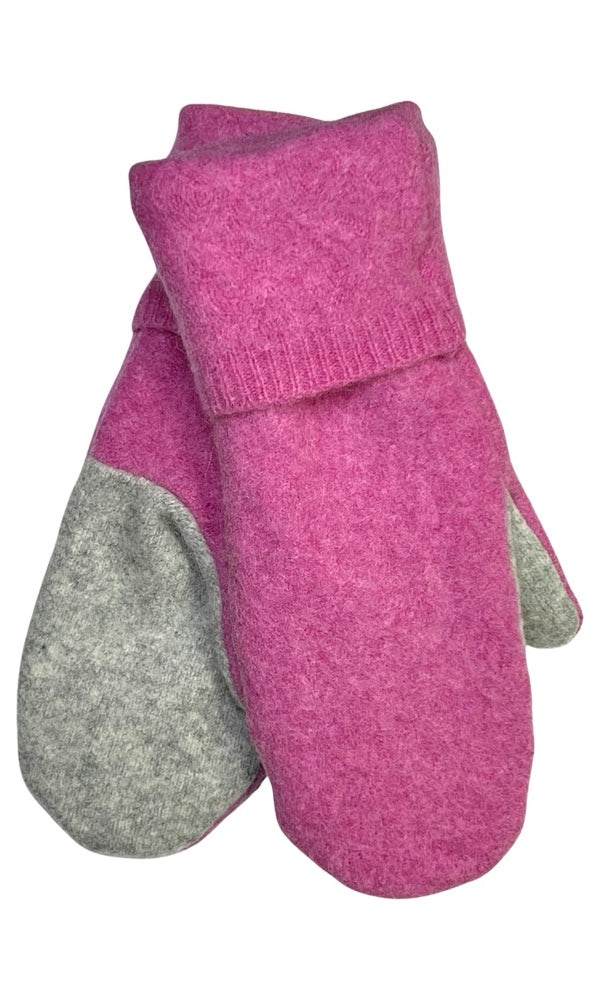 Traditional mittens are made from felted, fleece lined wool & are decorated with vintage or reclaimed buttons. Mittens fit most average women’s hands. Measurements: 11”L, 4”, 1” thick